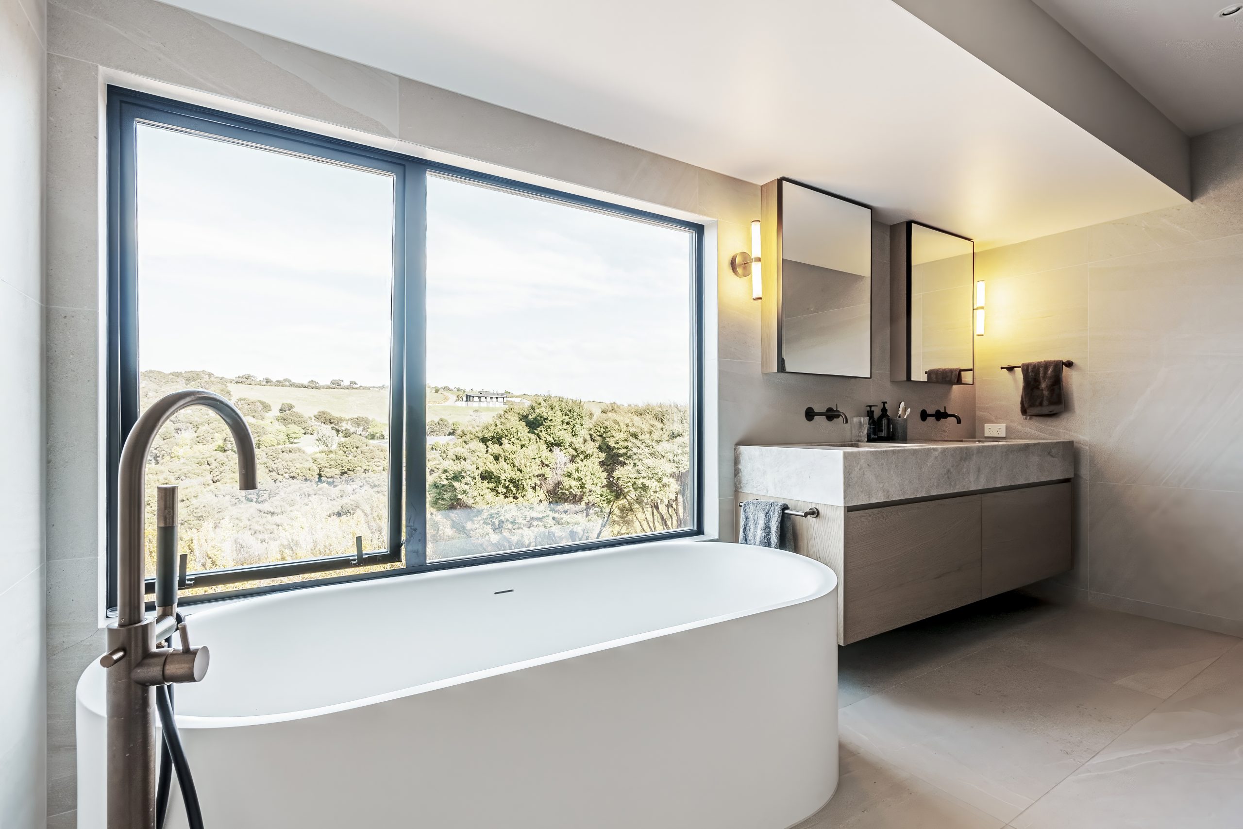Floating bathroom vanity with marble benchtop