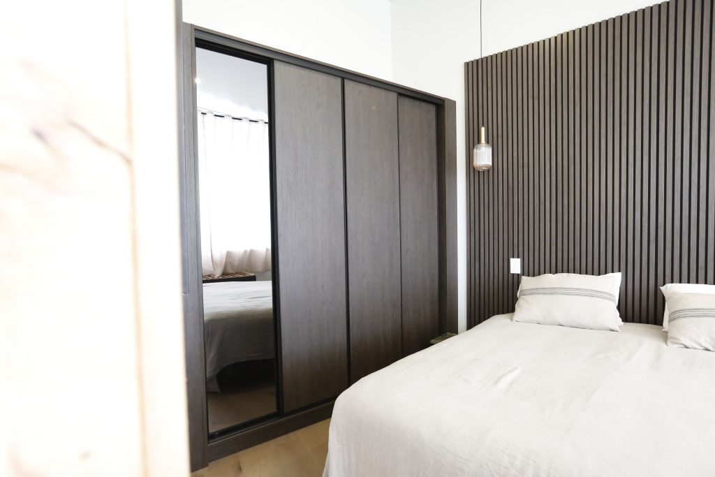 Dark oak custom wardrobe with tinted mirror sliding door 