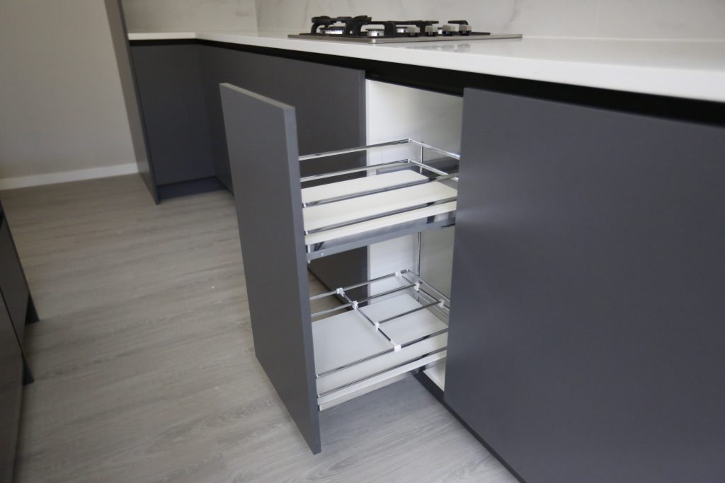 A Fully Handleless Sleek Minimalist black and white Kitchen Auckland