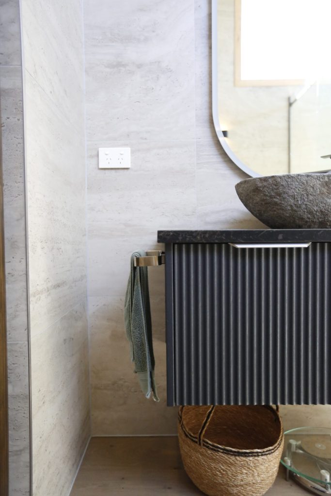 Fluted based modern black bathroom vanity with black engineered stone